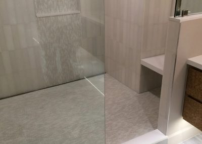 tile floor installation- room with a sink and a shower